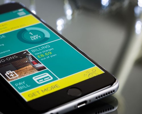 Secondary smartphone display showing tech interface
